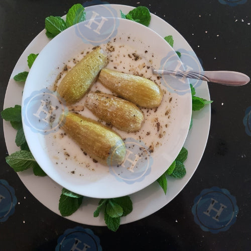 Kousa Bi Laban (Stuffed Zucchini in Yogurt)