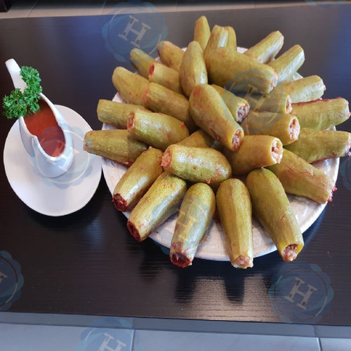 Kousa Bi Banadoura (Stuffed Zucchini)